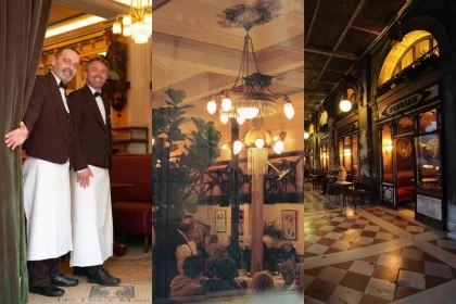 Colagem de três cenas do interior e exterior de cafeterias históricas europeias. À esquerda, dois garçons sorridentes com uniformes clássicos em frente a uma cortina de veludo, evocando o atendimento formal e acolhedor do Caffè Florian. Ao centro, um salão interno com lustres antigos e clientes em mesas redondas, refletindo a atmosfera sofisticada e cultural do Café Majestic. À direita, vista noturna da entrada ornamentada do Caffè Florian, com chão de mármore quadriculado e luzes âmbar refletindo nas vitrines históricas.